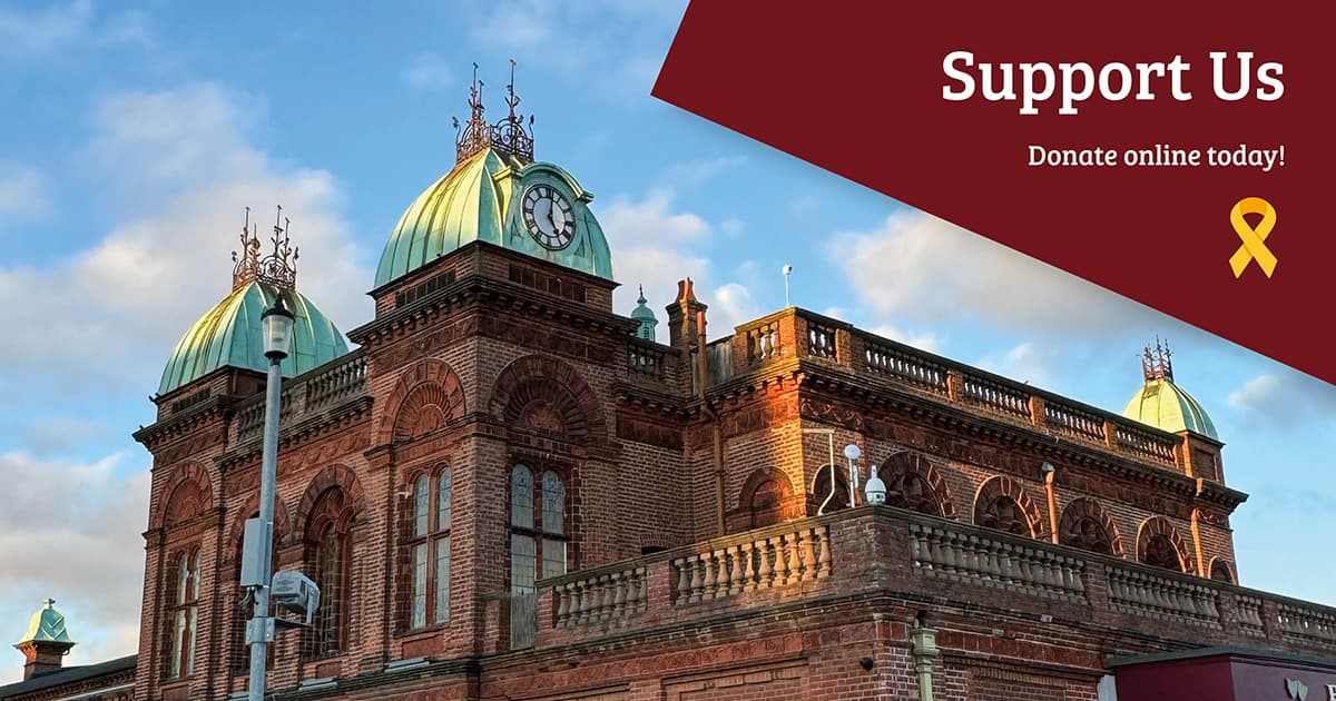 Image of the Pavilion Theatre building featuring the words 'Support Us, donate online today'